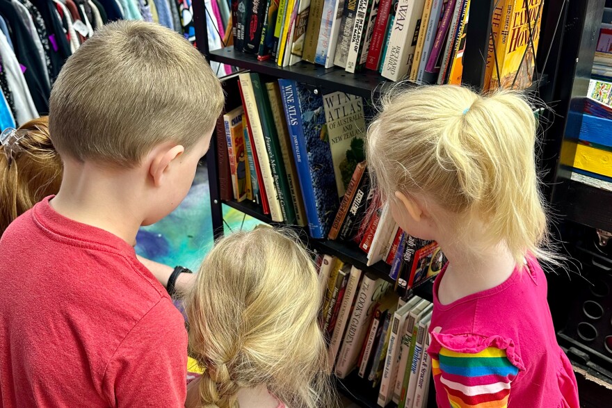 Kids looking at books