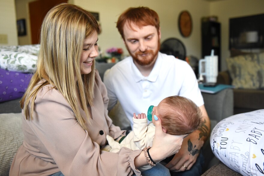 Brianna and Elijah Campo admire their son, Wesley, on Friday, Aug. 21, 2026, at their home at Fort Leonard Wood, the Army base where Brianna is stationed.