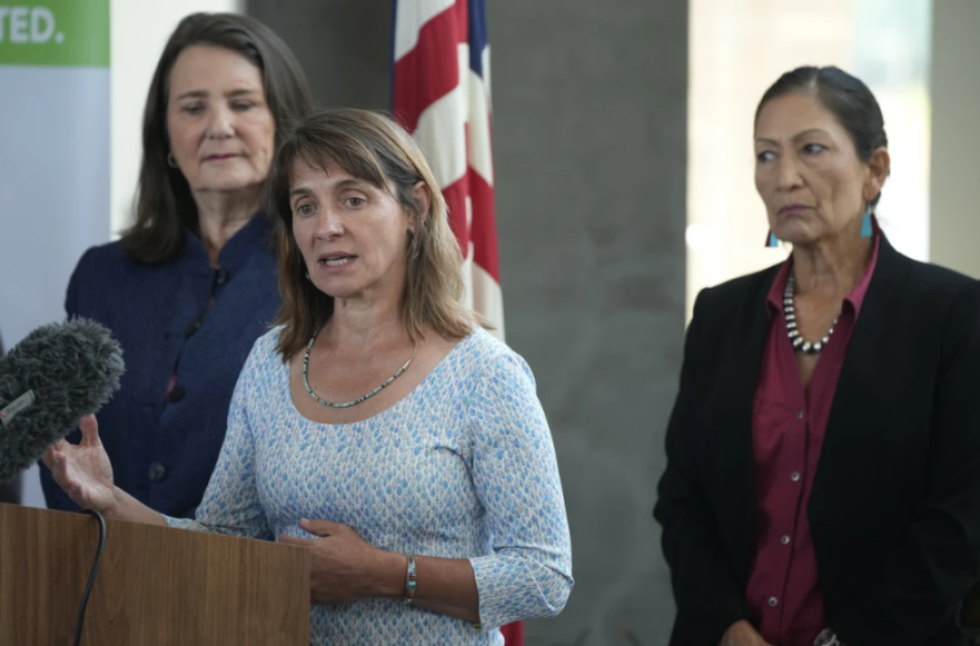 Tanya Trujillo, assistant secretary for water and science at the Department of the Interior, front, makes a point as U.S. Rep Diana DeGette, D-Colo., back left, and Interior Secretary Deb Haaland look on during a news conference at the offices of Denver Water, July 22, 2021, in Denver. Trujillo, a key official overseeing Colorado River negotiations, will step down from her role with the Interior Department on Monday, July 17, 2023.