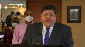 Gov. J.B. Pritzker speaks at a news conference in Chicago recently where he announced the next round of COVID-19 Business Interruption Grants and warned of future state budget cuts without further federal government intervention. On Tuesday, the seven-day average statewide COVID-19 test positivity rate stayed level at 3.5% as the Illinois Department of Public Health reported another 1,531 confirmed cases of the virus.
