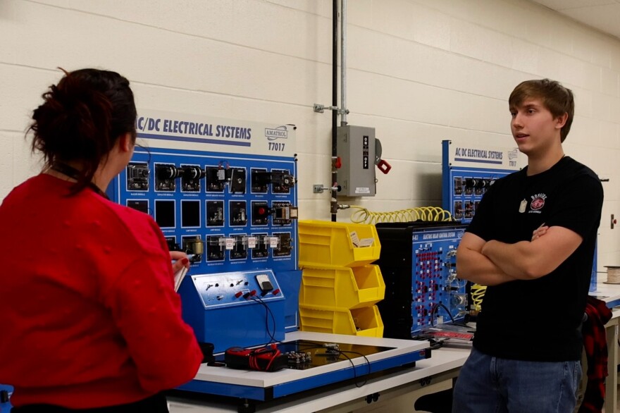 Colton Martin, a Workforce Ready Grant recipient, demonstrates how to use a circuit board at Ivy Tech Community College Bloomington.