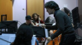 Shade Zajac conducts the GSO in rehearsal