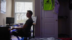 Liberty University student Jared Marshall, sits at his desk inside his apartment near Lynchburg, Virginia.