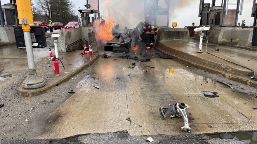 A member of Gov. Ayotte's security team assisted a driver in a fiery crash at the Bedford Toll Plaza on Tuesday.