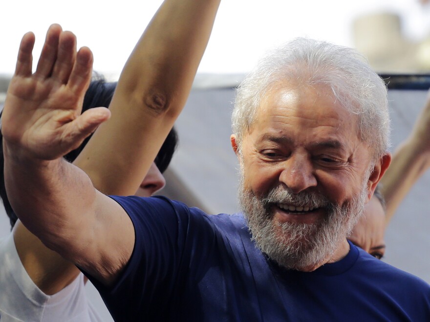 Brazil's former President Luiz Inacio Lula da Silva gestures to supporters in front of the metal workers union headquarters in Sao Bernardo do Campo, Brazil, Saturday.