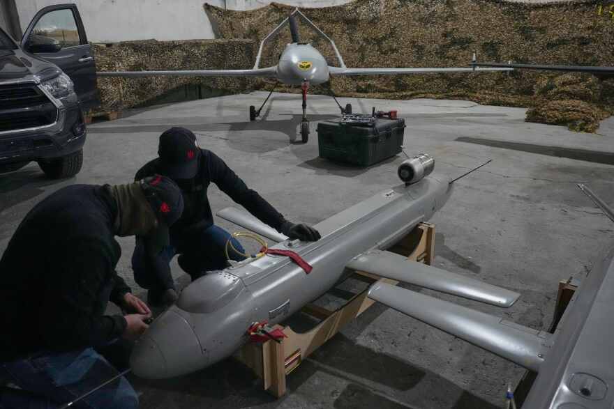 Servicemen of Ukraine's defense intelligence set up the Peklo (Hell) missile drone against Russian in an undisclosed location in Ukraine late Thursday, May 28, 2026. (AP Photo/Efrem Lukatsky)
