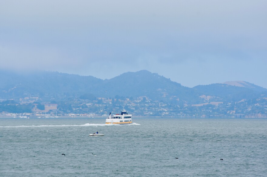 A ferry in the distance in the San Francisco Bay