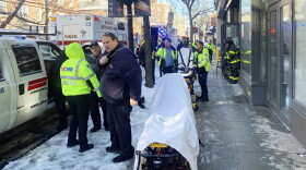 In this photo provided by New Haven CT Emergency Management Director Rick Fontana, ambulance and New Haven CT Fire Department personnel respond to a Yale University-owned building where nine construction workers and five Yale employees who were renovating it were hospitalized for carbon monoxide poisoning, Wednesday, Jan. 17, 2024, in New Haven, CT. One of the workers was found lying unconscious outside of the building, which is a couple of blocks from Yale's New Haven, campus, and was taken to a hospital's hyperbaric chamber in Brooklyn, NY, where he was in critical condition.