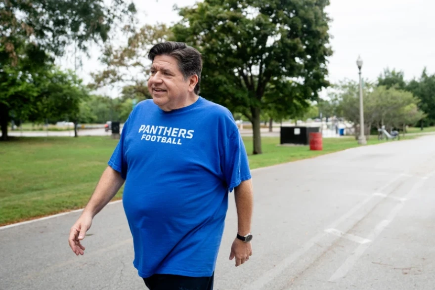 Gov. J.B. Pritzker walks along 31st Street Beach on the South Side Sept. 16.