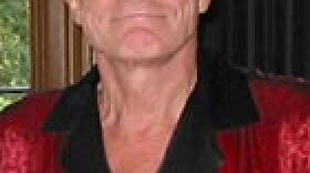 Hugh Hefner in his Playboy Mansion library.