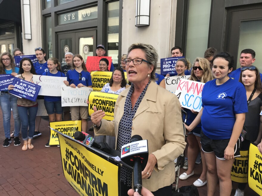 Susan B. Anthony List Indiana chair Sue Swayze Liebel leads a demonstration outside the Indianapolis office of Sen. Joe Donnelly (D-Ind.).