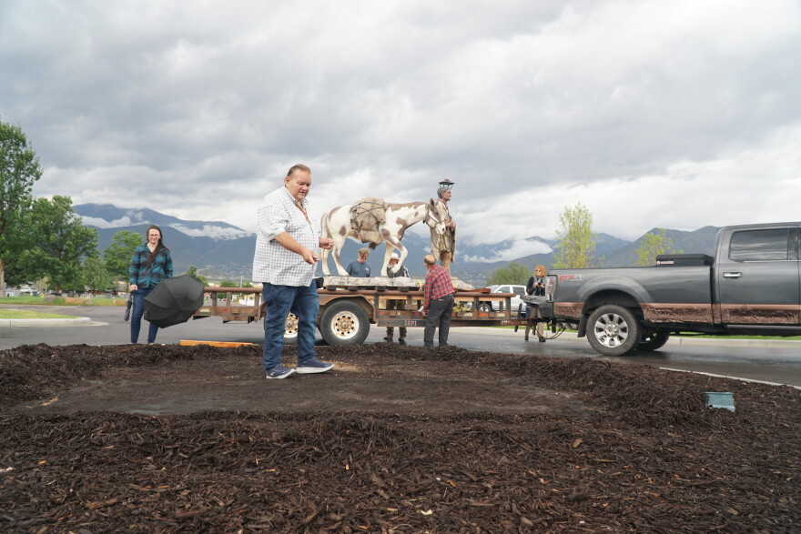 Perry Murdock preparing the ground where the Chief Tabby statue now stands.
