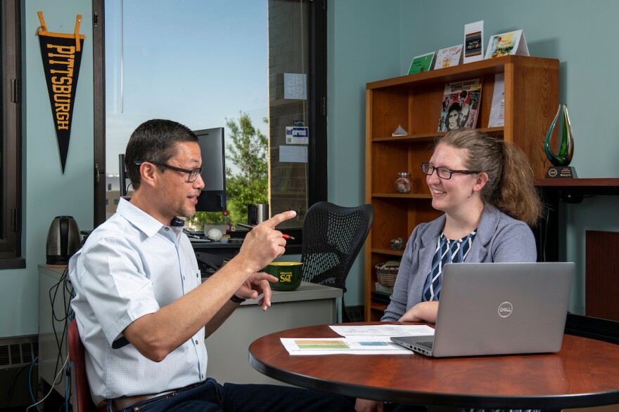 Javier Valentín-Sívico confers with his advisor, Dr. Casey Canfield, an assistant professor of engineering management and systems engineering. Less than 12 hours after S&T’s Kummer College was officially established, Valentín-Sívico successfully defended his dissertation, “Evaluating Barriers to and Impacts of Rural Broadband Access.”