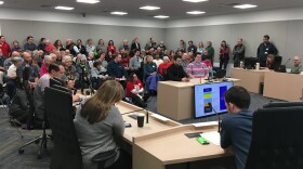 Alaskans testify before lawmakers during a House Finance Committee hearing on the state budget at the Legislative Information Office in Anchorage on March 24, 2019.