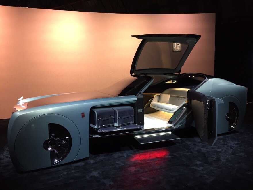 A futuristic Rolls Royce, imagines fun and luxury, for the idly rich in the future.