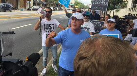 Democratic gubernatorial candidate Philip Levine talks with voters and media outside the Leon County Courthouse on August 22, 2018