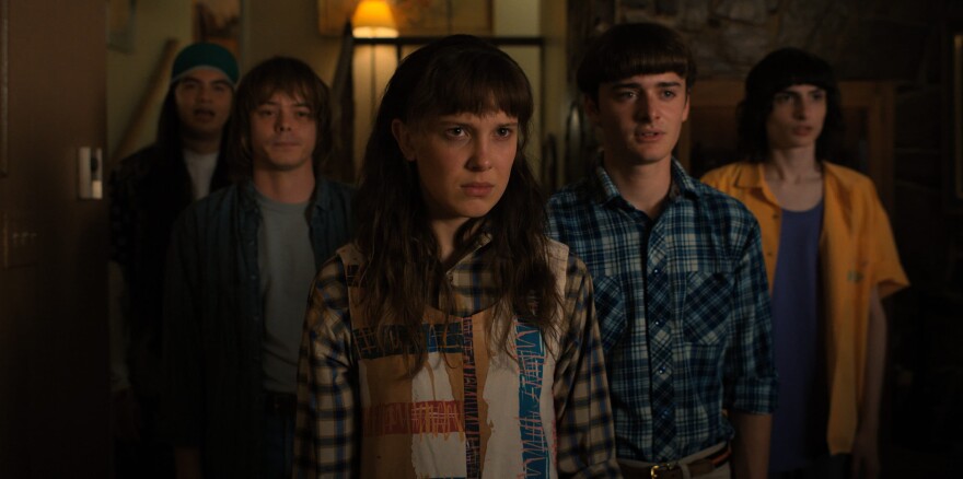 From left to right, Eduardo Franco as Argyle, Charlie Heaton as Jonathan, Millie Bobby Brown as Eleven, Noah Schnapp as Will Byers, and Finn Wolfhard as Mike Wheeler in "Stranger Things." (Courtesy of Netflix  © 2022)