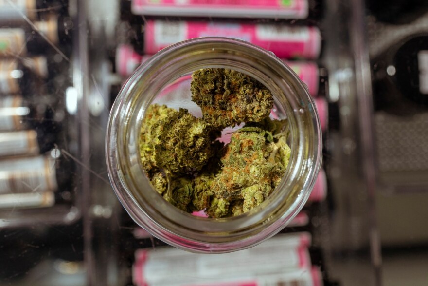 Happy Clouds smoke shop on Guadalupe Street in Austin displays hemp flower bud on March 30, 2026, the day before the state banned its sale.