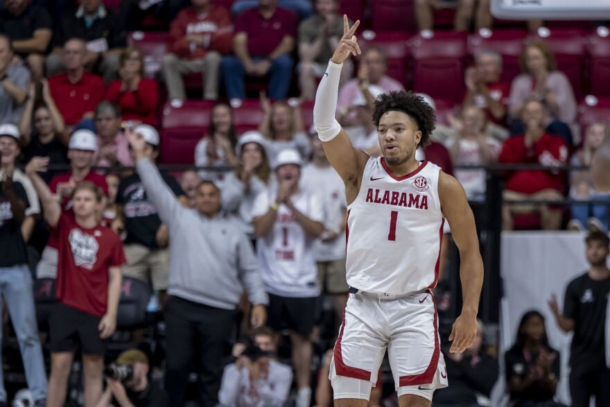 Alabama guard Mark Sears (1) celebrates after his 3-point basket during the first half of an NCAA college basketball game against North Carolina Asheville, Monday, Nov. 4, 2024, in Tuscaloosa, Ala. (AP Photo/Vasha Hunt)