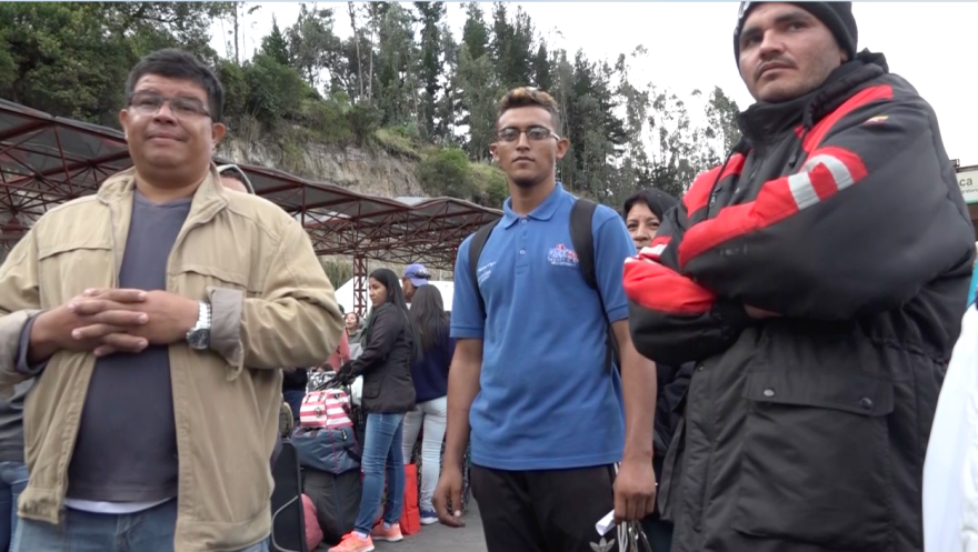 Venezuelan migrant Jose Molleja (center) with other frustrated Venezuelan refugees last week at the mountainous Colombia-Ecuador border crossing of Rumichaca.