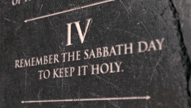 A view of the fourth commandment etched into a cracked stone tablet on an isolated background - 3D render