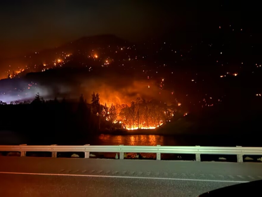 The Rowena Fire burns near Interstate 84 and U.S. 30 on June 11, 2025, outside The Dalles, Ore.