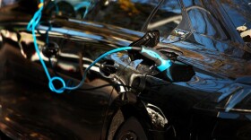 An electric car charges at a public charging station on Oct. 29, 2021 in Berlin, Germany. (Carsten Koall/Getty Images)