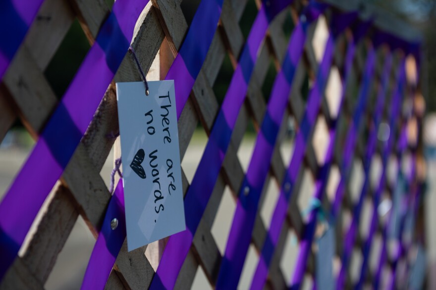 Seattle residents left notes for victims of the Seattle Center Shooting at a silent vigil.
