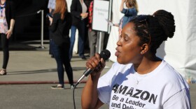 SEIU organizer Patience Malaba leads a protest while Amazon shareholders enter the company’s annual shareholders meeting in Seattle in May.