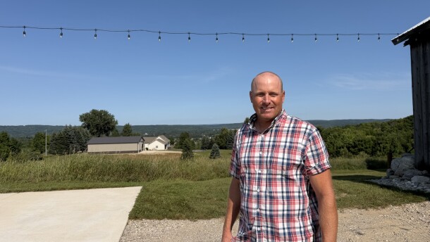 Farmer John Boyer stands on his East Jordan property. Boyer entered 131 acres of farmland into a conservation easement this year, restricting future development.