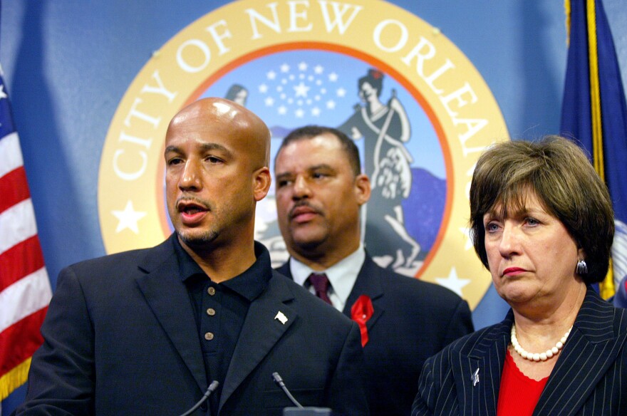 New Orleans Mayor Ray Nagin (left), accompanied by Councilman Oliver Thomas and Louisiana Gov. Kathleen Blanco, speak at a news conference at New Orleans City Hall on Aug. 27, 2005. A mandatory evacuation was ordered the next day, as Hurricane Katrina appeared headed for a direct hit on the city Monday, Aug. 29.