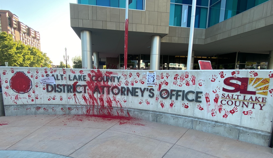 Salt Lake County District Attorney Sim Gill’s office was the target of protesters on Thursday after he announced a ruling that no charges would be filed against the officers who killed  Bernardo Palacios-Carbajal on May 23.