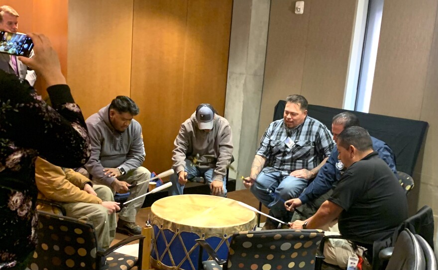A drum group plays at the swearing-in event. 