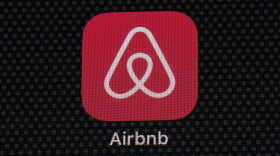 The Airbnb app icon is displayed on an iPad screen in Washington, D.C., on May 8, 2021.