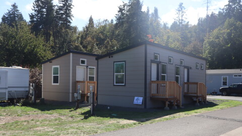 In this Sept. 18, 2026 photo, a pair of newly-installed one-bedroom HOPE homes sits near the front of Saginaw Mobile Home Park.