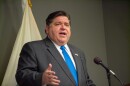 Illinois governor JB Pritzker at podium