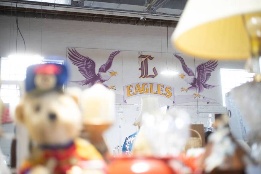 Evidence of the antique mall’s use as a high school is evident in many features, namely the old mural up on the wall, juxtaposed against thousands of knick-knacks and collectibles.