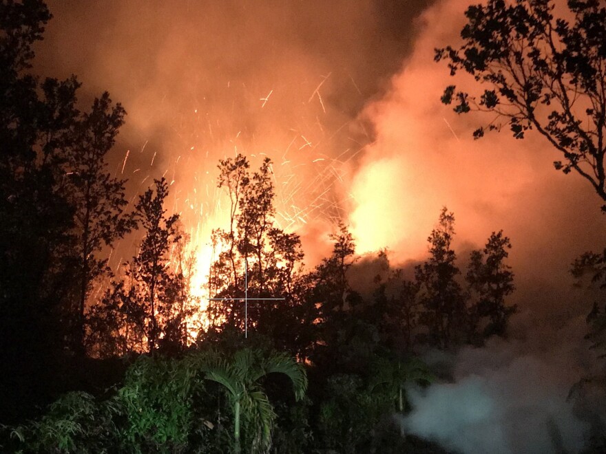 A new lava vent opened up on a residential street in the Leilani Estates neighborhood near Kīlauea volcano Friday morning. Spatter was being thrown nearly 100 feet high at the time the photo was made.