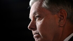 FILE - Sen Lindsey Graham, R-S.C., speaks to the media before the CBS News Republican presidential debate at the Peace Center, Saturday, Feb. 13, 2016, in Greenville, S.C. (AP Photo/Rainier Ehrhardt, File)