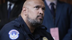 FILE - U.S. Capitol Police Sgt. Harry Dunn listens as the House select committee investigating the Jan. 6 attack on the U.S. Capitol holds its final meeting on Capitol Hill in Washington, Monday, Dec. 19, 2022. Dunn, who defended the U.S. Capitol on Jan. 6 announced Wednesday, Jan. 3, 2024 he is running for Congress in Maryland. (AP Photo/Jacquelyn Martin, File)