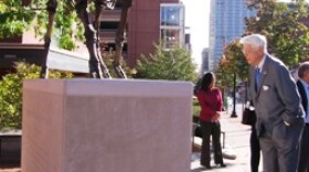 Kemper Museum founder, Crosby Kemper, leans in for a closer look at Marc Swanson's "Descent of Civilization (Bison Memorial)" 2010, 9th and Broadway, KCMO