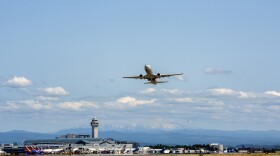 A plane takes off at the Portland International Airport.