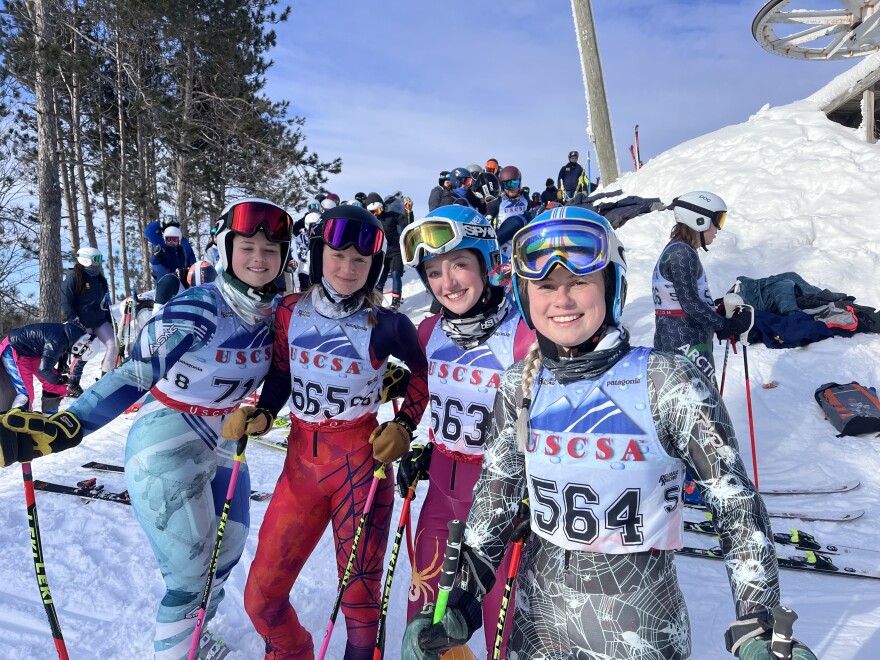 Members of MSU ski and snowboarding team pose for a photo.