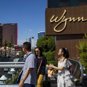 People walk near the Wynn Las Vegas resort on Wednesday, July 26, 2023, in Las Vegas.