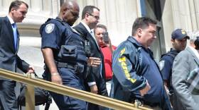 Former Subway spokesman Jared Fogle leaves federal court in Indianapolis Wednesday, Aug. 19 after agreeing to plead guilty to child pornography and child-sex abuse charges.