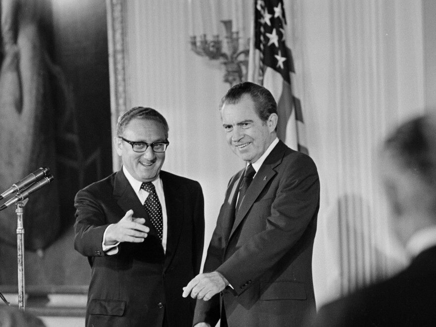U.S. Secretary of State Henry Kissinger, left, and President Richard M. Nixon are shown after Kissinger was sworn in in the East Room of the White House on Sept. 22, 1973.