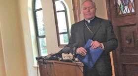Bishop Edward J. Burns during the diocese's May 15 press conference at Holy Trinity Catholic Church on Oak Lawn, across the street from the diocese, in response to a May 15 police raid.