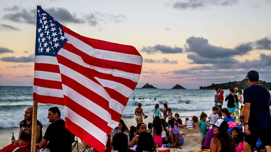 Crowds gather to watch the Fourth of July fireworks show last year at Kailua Beach on the Hawaiian island of Oahu.