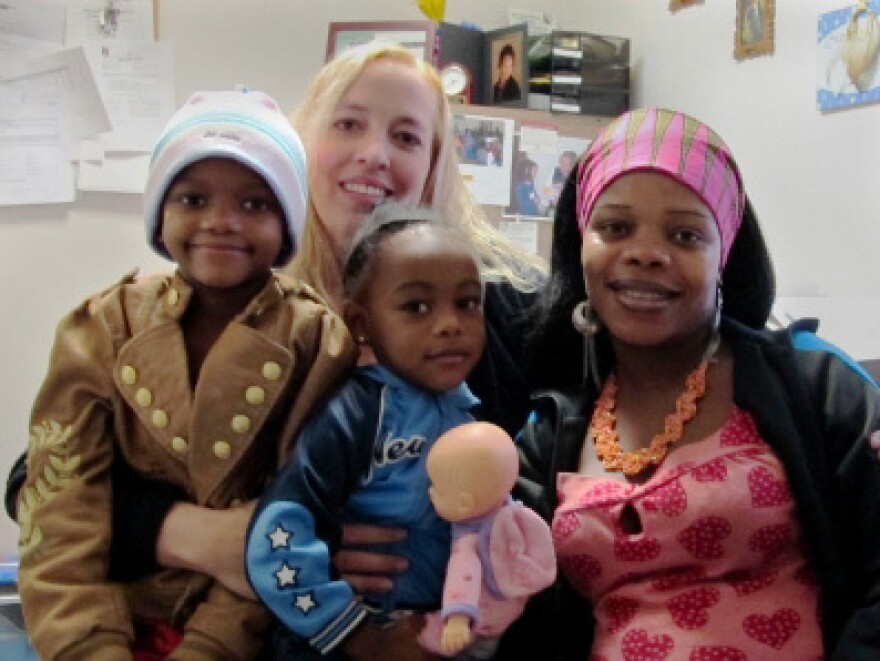 Nowela Virginie and her daughters often visit social worker Marcia Munden at Catholic Charities of Idaho.