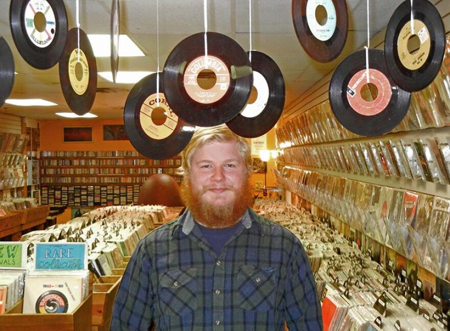 Co-manager Sean Hartman at The Corner Record Shop and Audio in Kalamazoo.